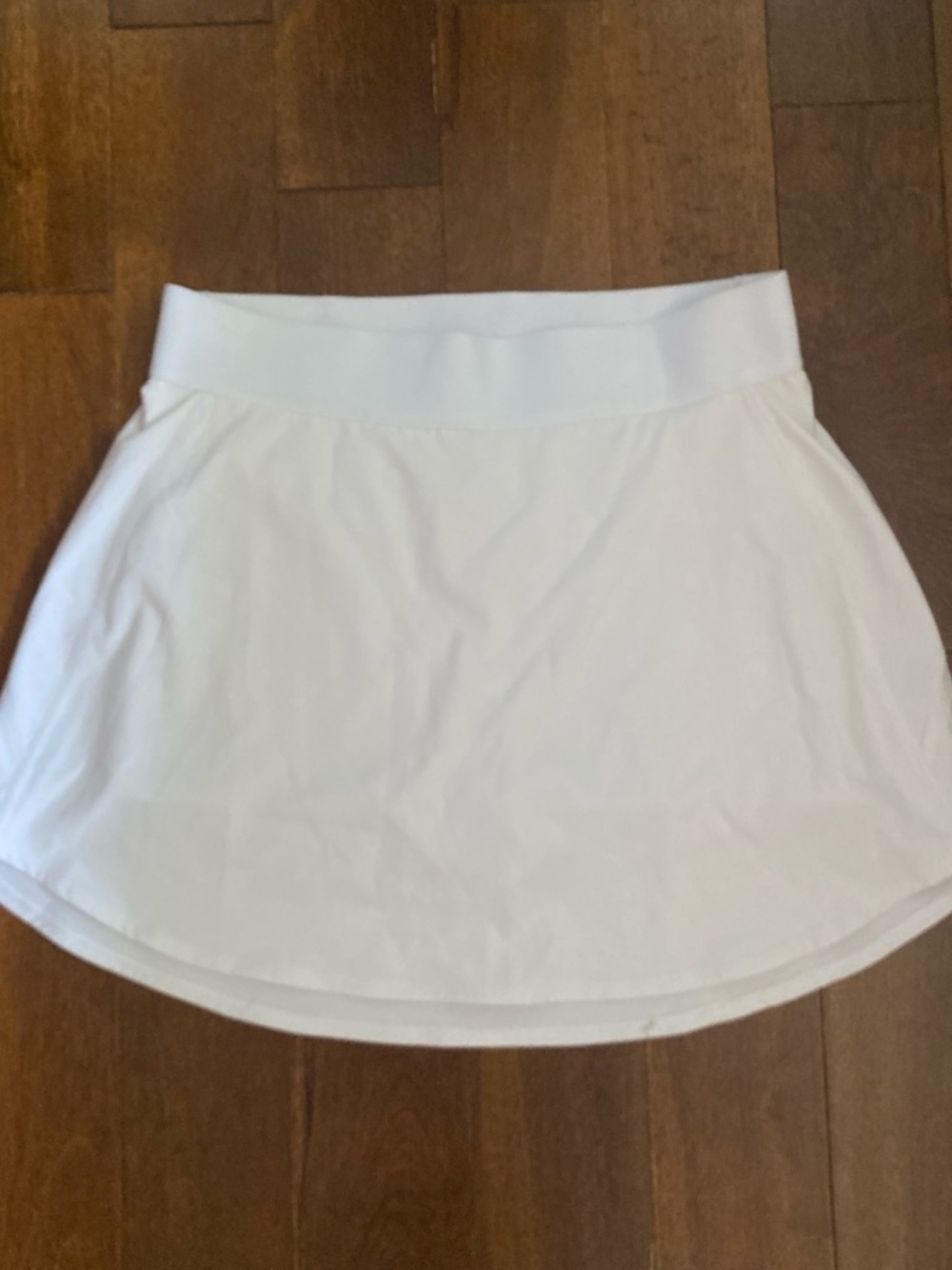 Tna active wear skirt with build in shorts